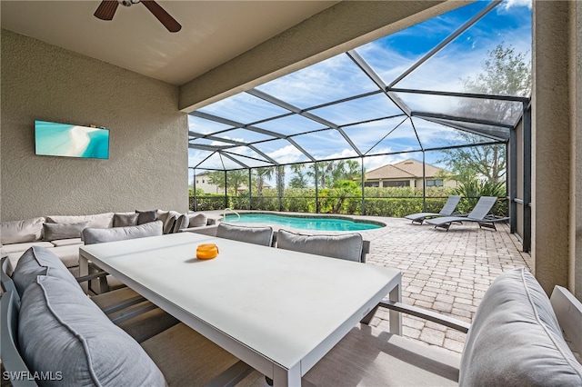 4424 Owens Way, Ave Maria, FL 34142 - view of patio featuring an outdoor living space, ceiling fan, an outdoor pool, and glass enclosure