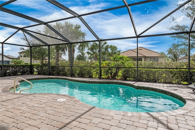 4424 Owens Way, Ave Maria, FL 34142 - outdoor pool featuring a patio and glass enclosure