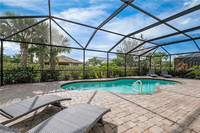 4424 Owens Way, Ave Maria, FL 34142 - outdoor pool featuring a patio and glass enclosure