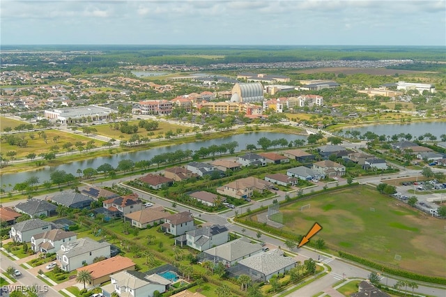 4424 Owens Way, Ave Maria, FL 34142 - aerial view of property and surrounding area with a nearby body of water and nearby suburban area