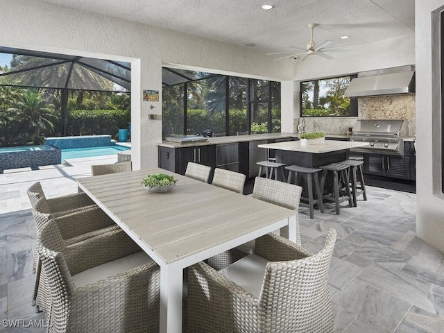 dining area with ceiling fan, a textured wall, recessed lighting, and a textured ceiling