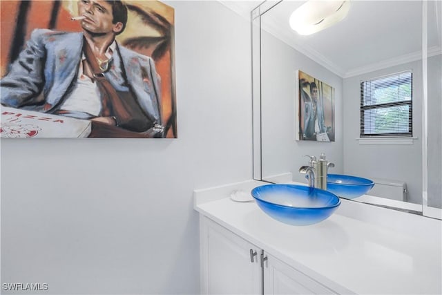 410 La Peninsula Blvd Unit 410, Naples, FL 34113 - bathroom with vanity and ornamental molding