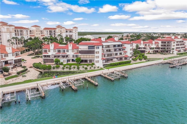 410 La Peninsula Blvd Unit 410, Naples, FL 34113 - aerial view featuring a water view