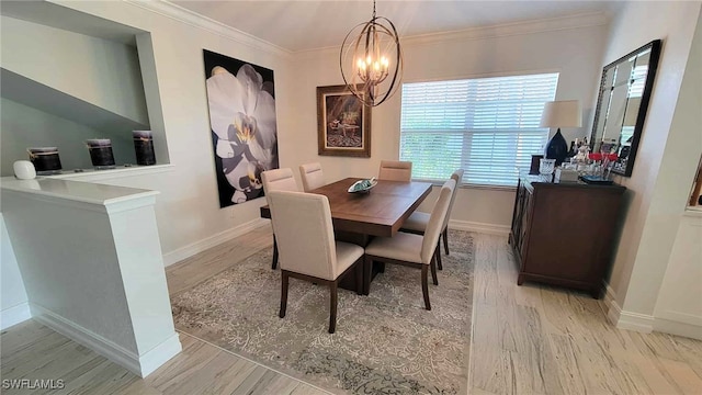 dining area featuring a notable chandelier, a wealth of natural light, and light wood-style floors