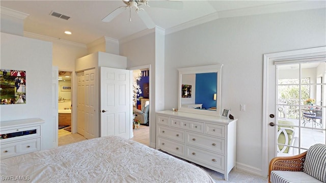 bedroom with crown molding, visible vents, light carpet, baseboards, and ensuite bath