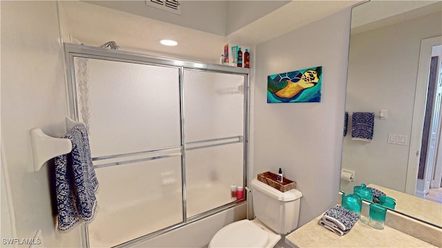 bathroom with visible vents, vanity, toilet, recessed lighting, and bath / shower combo with glass door