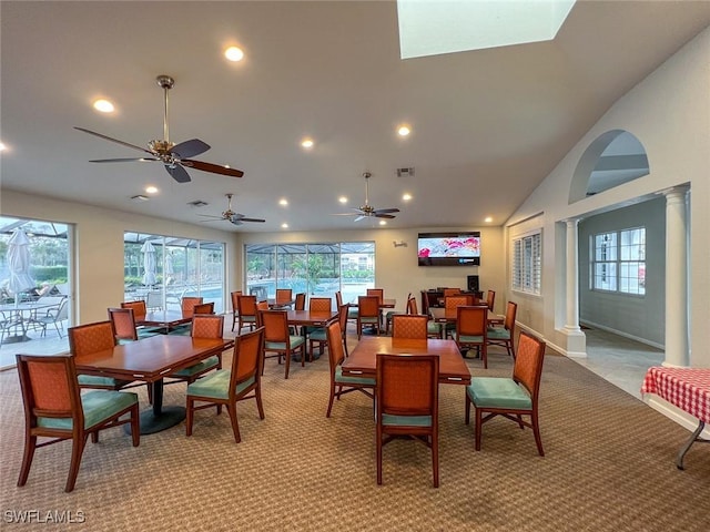 dining area featuring recessed lighting, light colored carpet, a healthy amount of sunlight, and visible vents