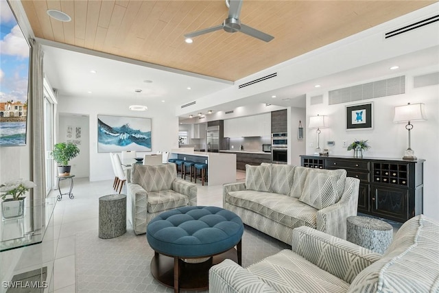724 Plantation Ct, Marco Island, FL 34145 - living area with a ceiling fan, light tile patterned floors, and recessed lighting