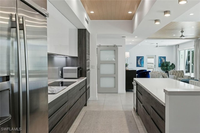 724 Plantation Ct, Marco Island, FL 34145 - kitchen featuring stainless steel fridge with ice dispenser, modern cabinets, ceiling fan, recessed lighting, and light countertops