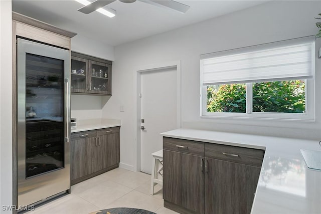 724 Plantation Ct, Marco Island, FL 34145 - bar featuring light tile patterned flooring, wine cooler, and ceiling fan