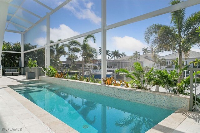 724 Plantation Ct, Marco Island, FL 34145 - outdoor pool with a patio
