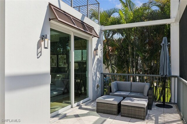 724 Plantation Ct, Marco Island, FL 34145 - balcony featuring outdoor lounge area