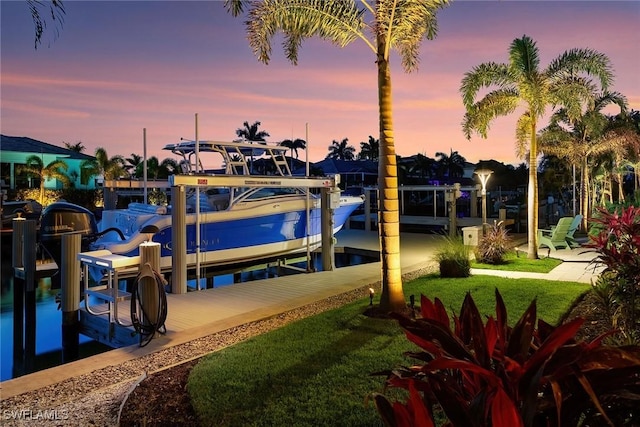 724 Plantation Ct, Marco Island, FL 34145 - dock featuring boat lift and a yard
