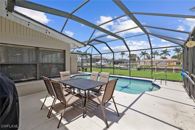 pool featuring a patio, glass enclosure, a yard, and a residential view
