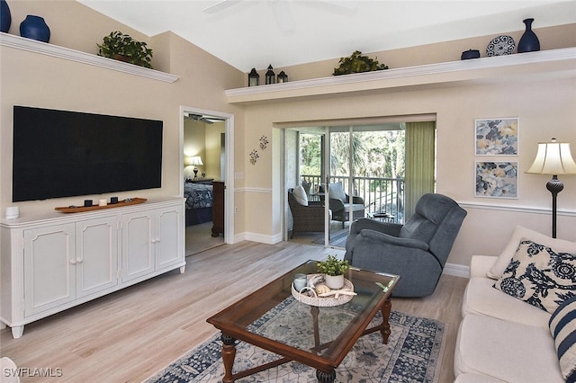 3665 Buttonwood Way Unit 1422, Naples, FL 34112 - living area featuring a ceiling fan, baseboards, vaulted ceiling, and light wood-style flooring