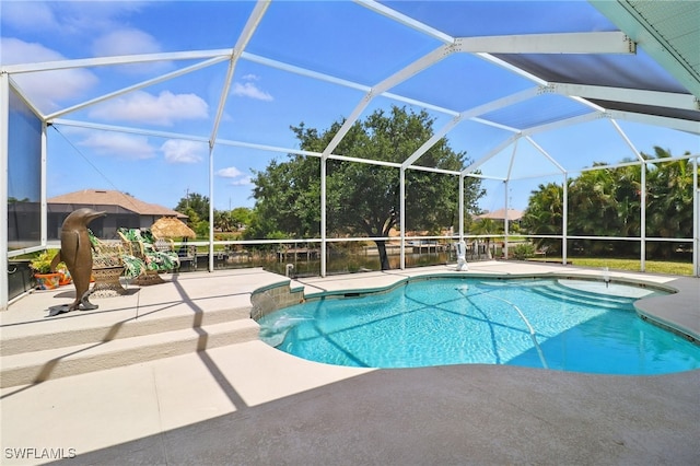 outdoor pool featuring a patio and a lanai
