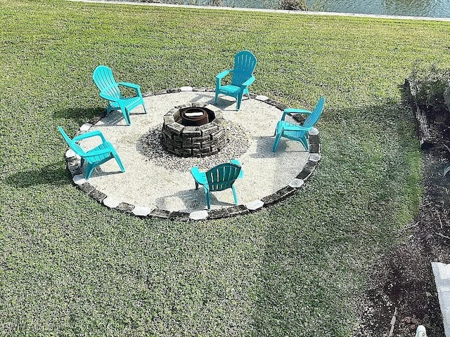 exterior space featuring an outdoor fire pit
