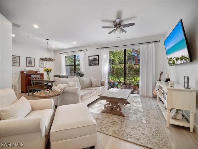 15780 Portofino Springs Blvd Unit 106, Fort Myers, FL 33908 - living area with a ceiling fan, visible vents, recessed lighting, and light wood-style floors