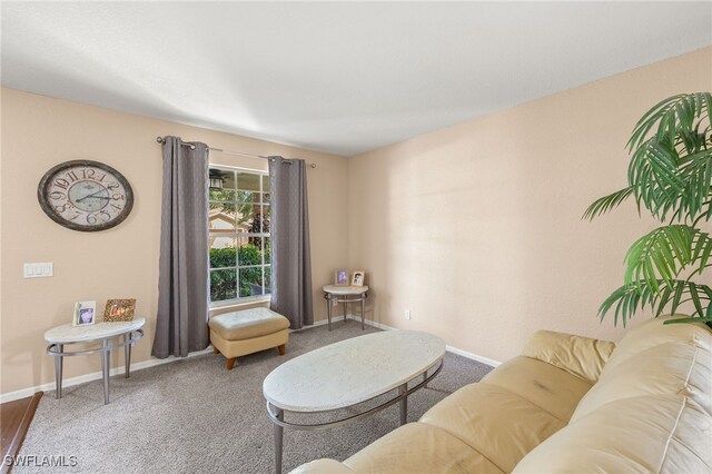 living room featuring baseboards