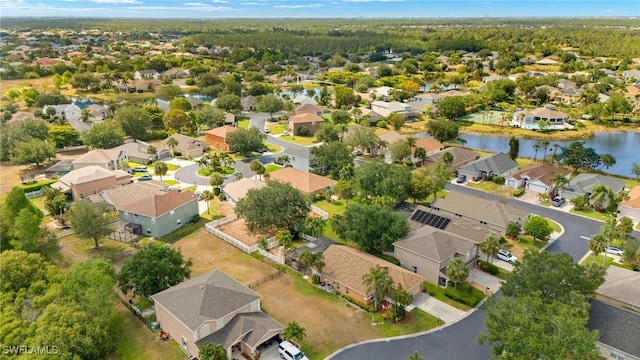 aerial view featuring a residential view and a water view