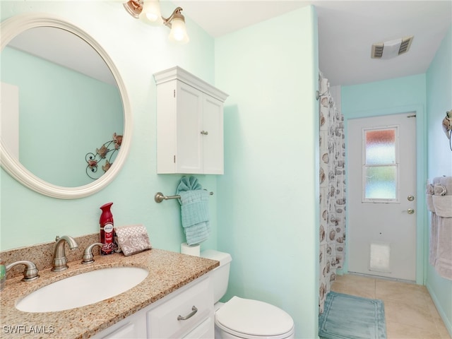 1800 SE 21st St, Cape Coral, FL 33990 - bathroom featuring visible vents, tile patterned flooring, vanity, curtained shower, and toilet