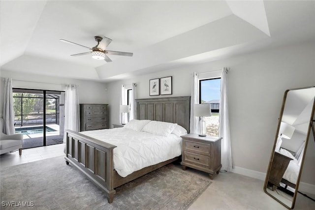 2016 SW 28th Ln, Cape Coral, FL 33914 - bedroom featuring multiple windows, access to outside, a raised ceiling, and ceiling fan
