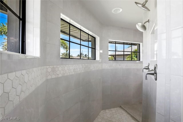 2016 SW 28th Ln, Cape Coral, FL 33914 - full bathroom with tile walls and tiled shower