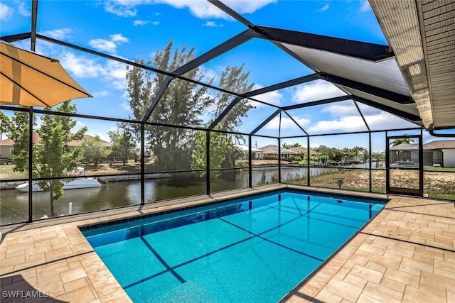 2016 SW 28th Ln, Cape Coral, FL 33914 - pool with a water view, glass enclosure, and a patio