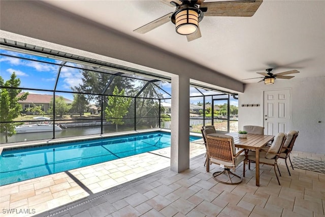 2016 SW 28th Ln, Cape Coral, FL 33914 - pool with a water view, glass enclosure, a patio, and ceiling fan