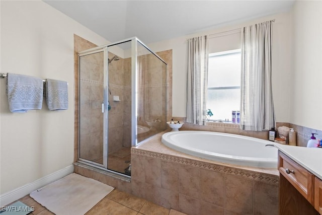 209 SE 3rd Ter, Cape Coral, FL 33990 - full bathroom with a garden tub, vanity, tile patterned flooring, and a stall shower