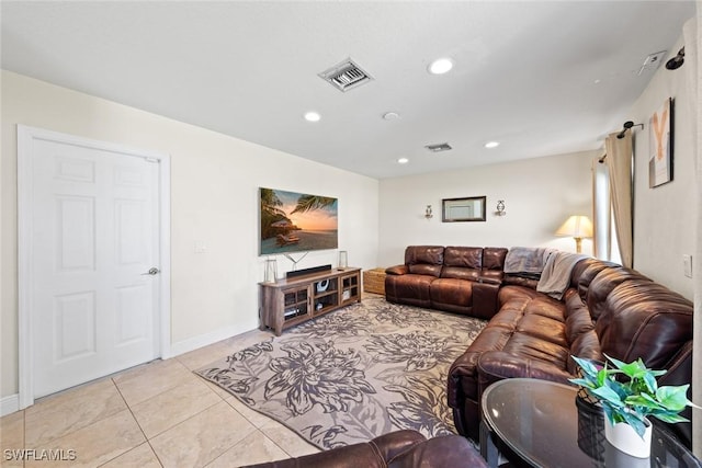 209 SE 3rd Ter, Cape Coral, FL 33990 - living area featuring visible vents, baseboards, light tile patterned flooring, and recessed lighting