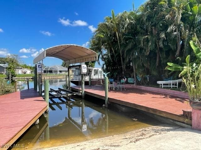 303 Georgia Ave, Fort Myers, FL 33905 - view of dock featuring a water view and boat lift