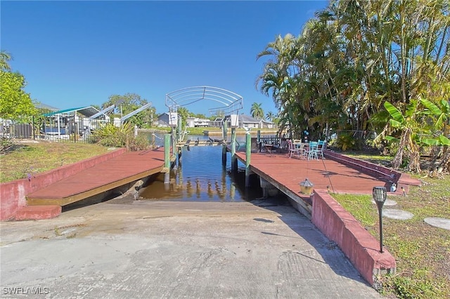 303 Georgia Ave, Fort Myers, FL 33905 - dock area with boat lift and a residential view