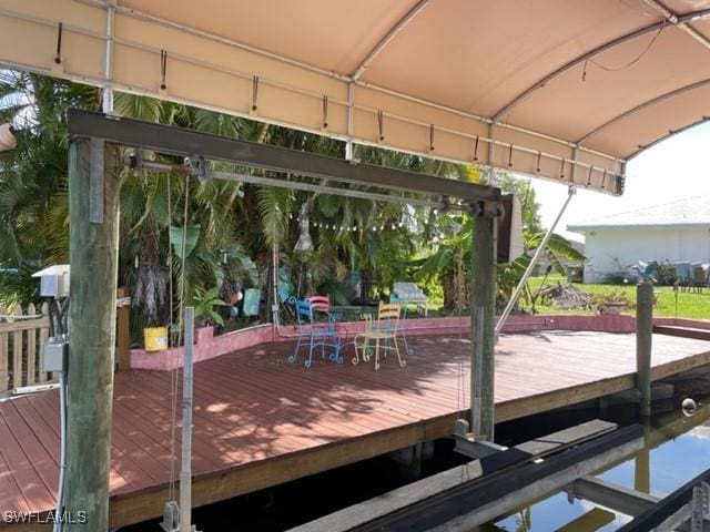 303 Georgia Ave, Fort Myers, FL 33905 - wooden terrace featuring a dock
