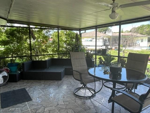 303 Georgia Ave, Fort Myers, FL 33905 - sunroom / solarium with an outdoor hangout area, a wealth of natural light, and ceiling fan
