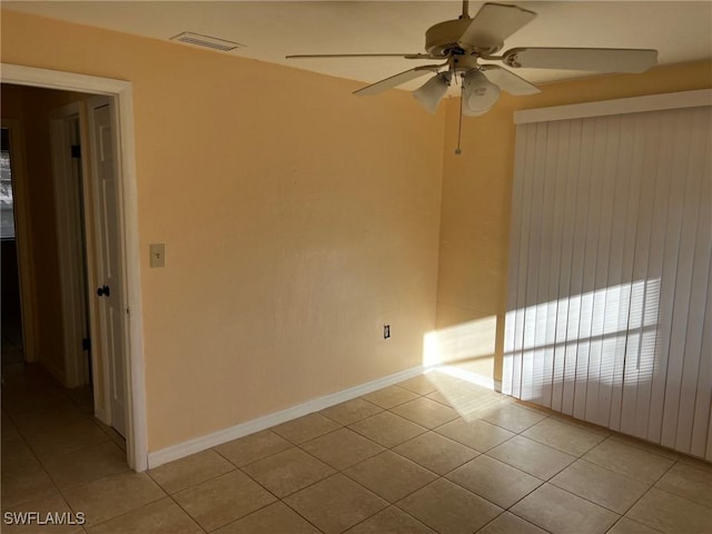 303 Georgia Ave, Fort Myers, FL 33905 - empty room featuring light tile patterned floors, baseboards, visible vents, and ceiling fan