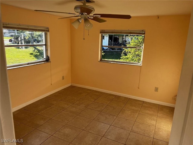 303 Georgia Ave, Fort Myers, FL 33905 - unfurnished room featuring a ceiling fan, baseboards, and tile patterned floors