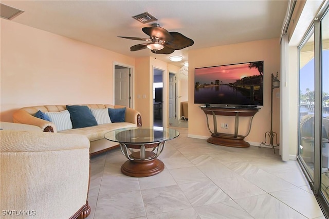 147 Coral Dr, Fort Myers, FL 33905 - living area with ceiling fan, baseboards, and visible vents