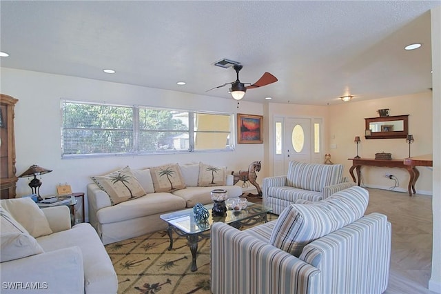 147 Coral Dr, Fort Myers, FL 33905 - living area featuring a ceiling fan, recessed lighting, visible vents, and plenty of natural light