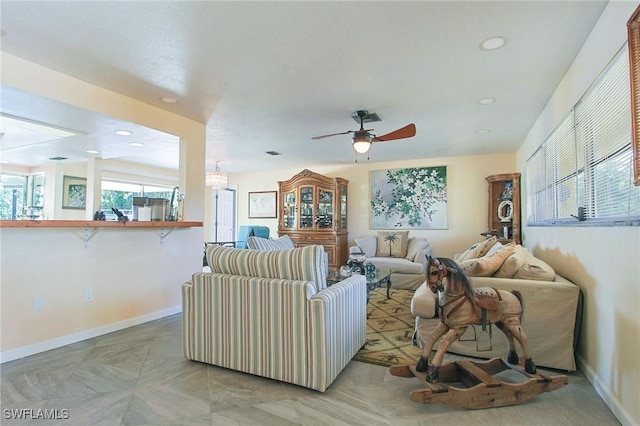 147 Coral Dr, Fort Myers, FL 33905 - living area with baseboards, recessed lighting, and a ceiling fan