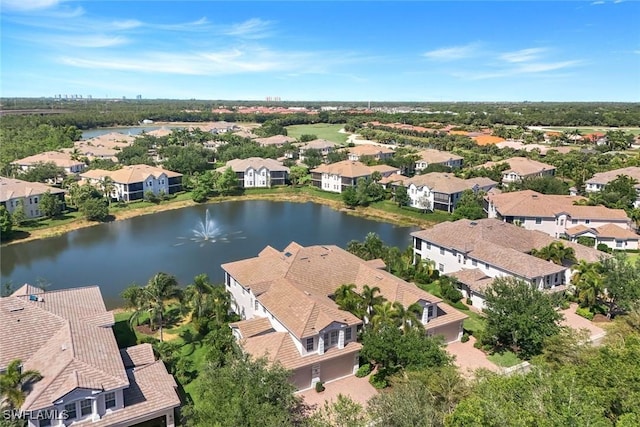 aerial view with a residential view and a water view