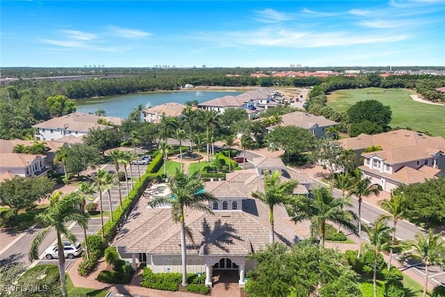 aerial view with a residential view and a water view
