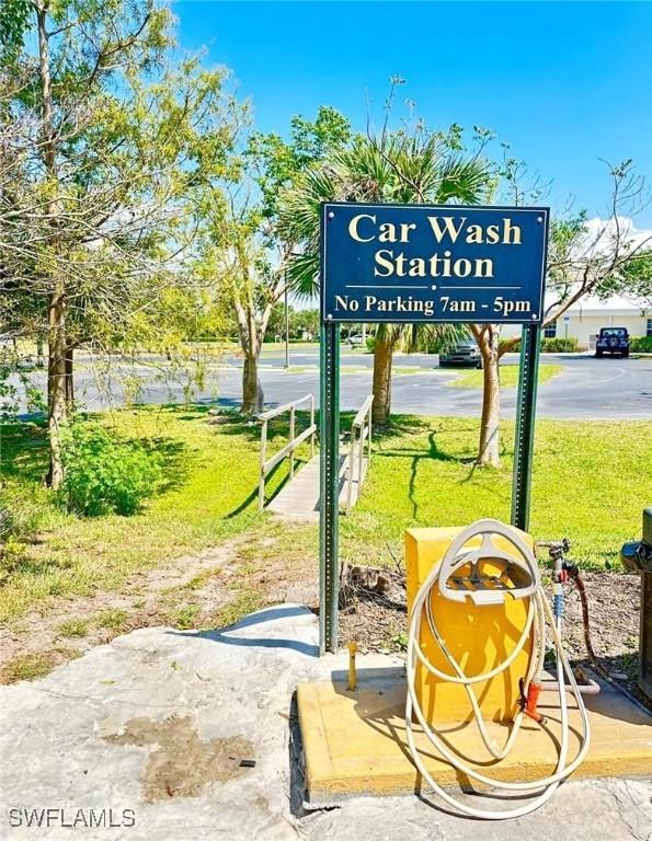 13515 Eagle Ridge Dr Unit 522, Fort Myers, FL 33912 - exterior space featuring a lawn