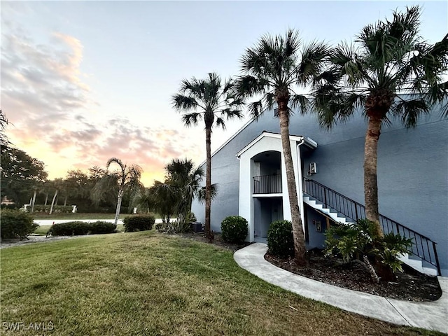 13515 Eagle Ridge Dr Unit 522, Fort Myers, FL 33912 - property at dusk featuring stairs