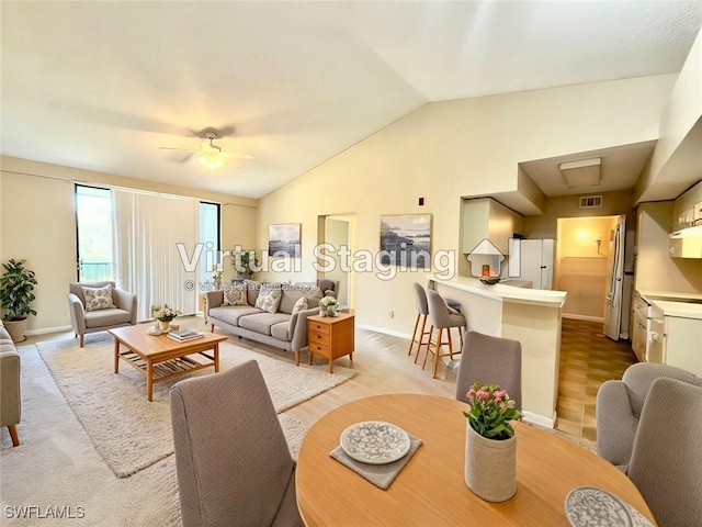 13515 Eagle Ridge Dr Unit 522, Fort Myers, FL 33912 - dining area with a ceiling fan, baseboards, vaulted ceiling, and visible vents