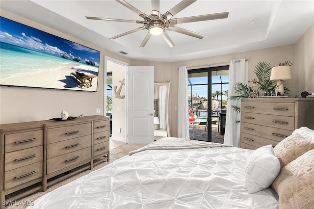 bedroom with visible vents, ceiling fan, and access to exterior