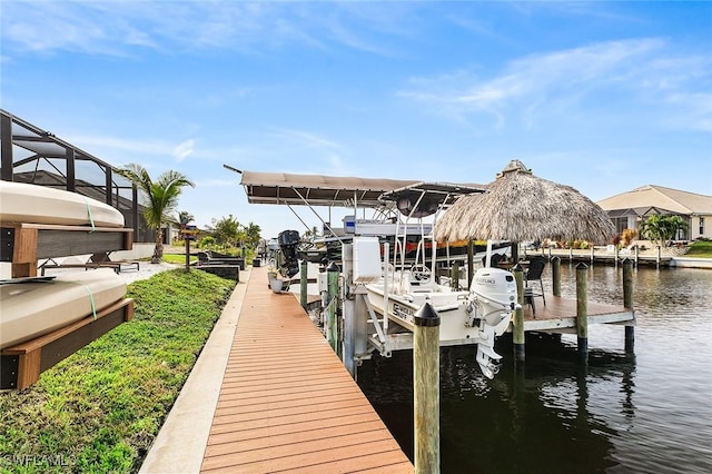 dock area featuring a water view and boat lift