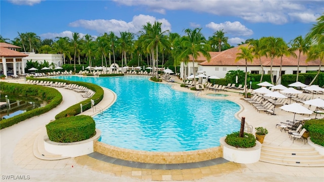 pool with a patio