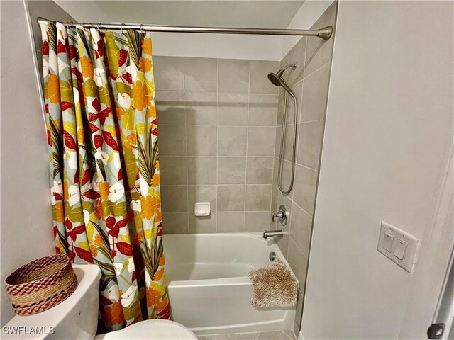 5445 Double Eagle Cir Unit 3012, Ave Maria, FL 34142 - bathroom featuring shower / tub combo and toilet