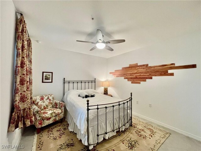 5445 Double Eagle Cir Unit 3012, Ave Maria, FL 34142 - bedroom featuring light colored carpet, baseboards, and ceiling fan